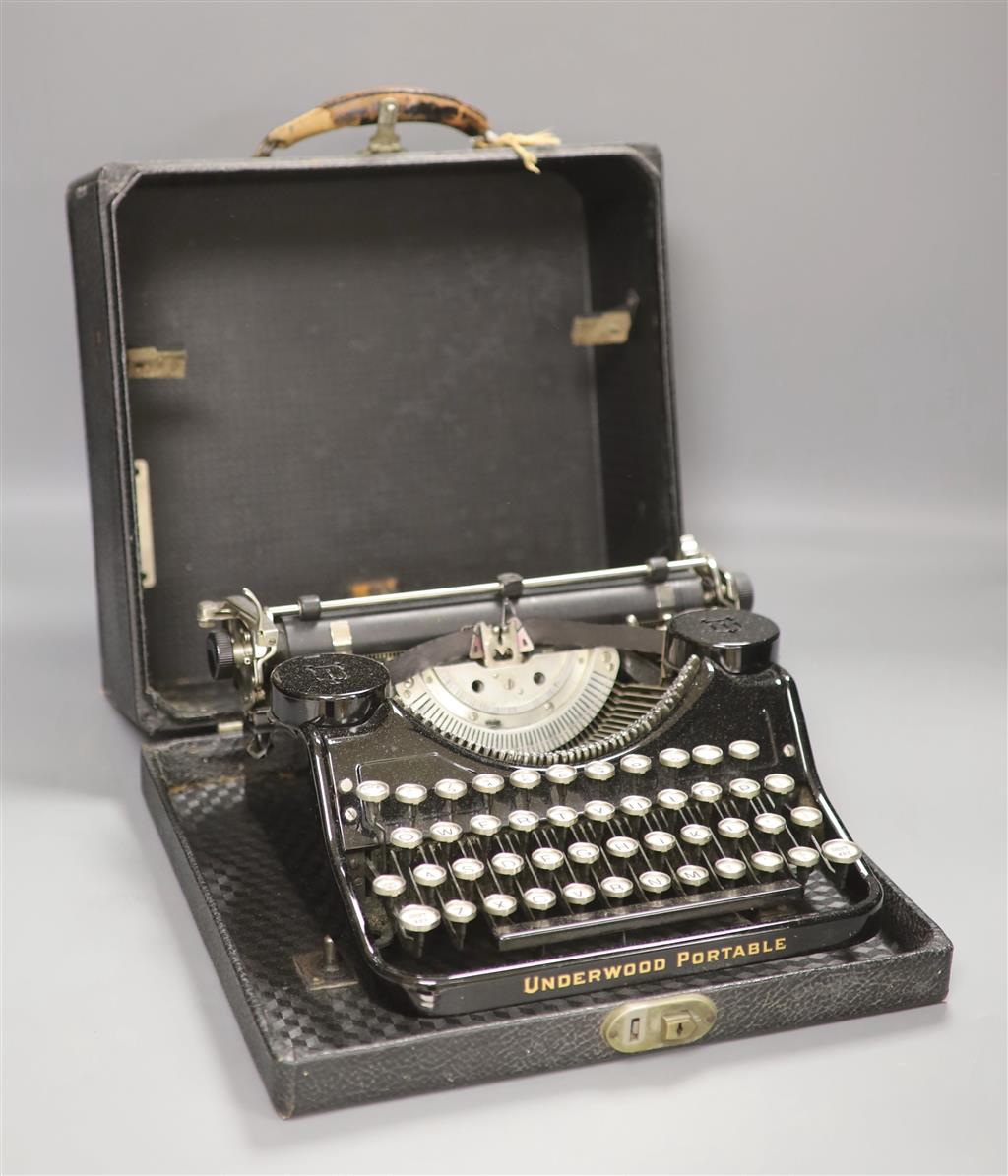 An early 20th century Underwood Elliott Fisher Ltd portable cased typewriter